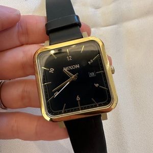 Nixon gold and black watch